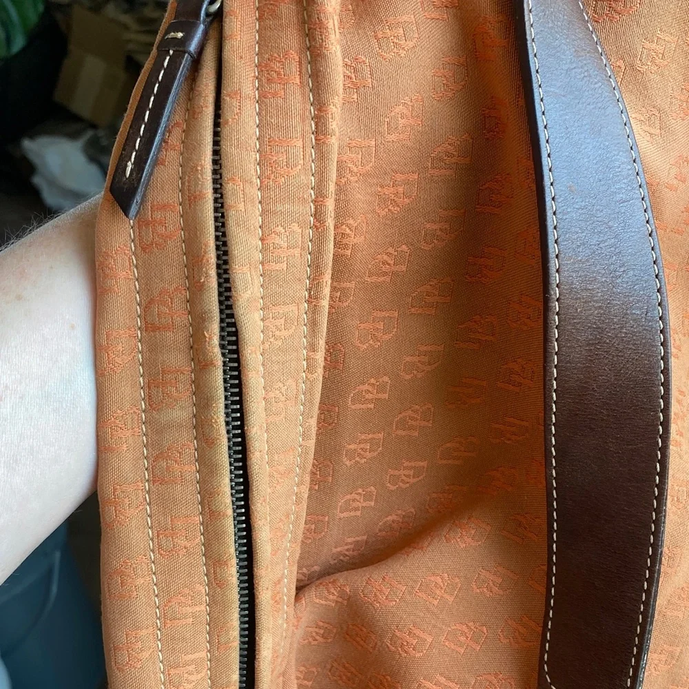 Dooney & Bourke Vintage burnt Orange over the shoulder bucket Bag